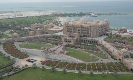 UAE National flag formed by staff of Emirates Palace Hotel